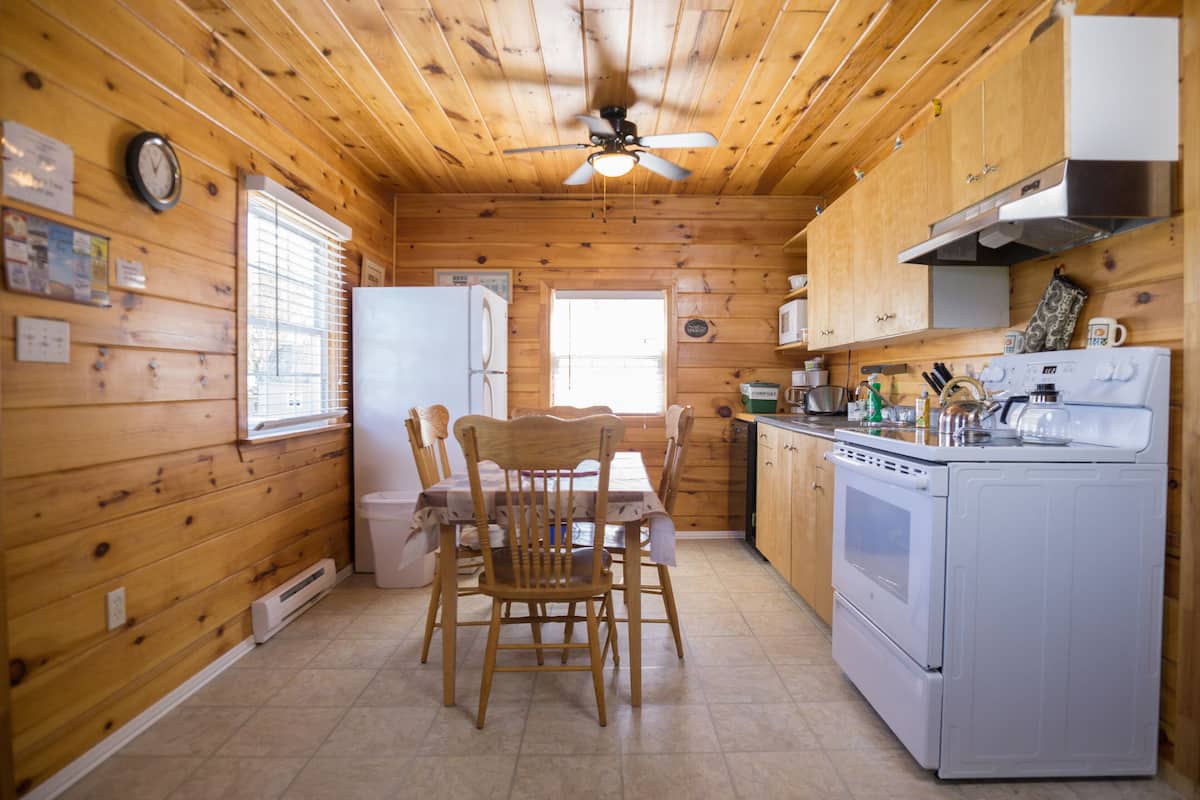 deluxe cottage, 2 bedrooms (1 queen and 2 double beds) | private kitchen | electric kettle