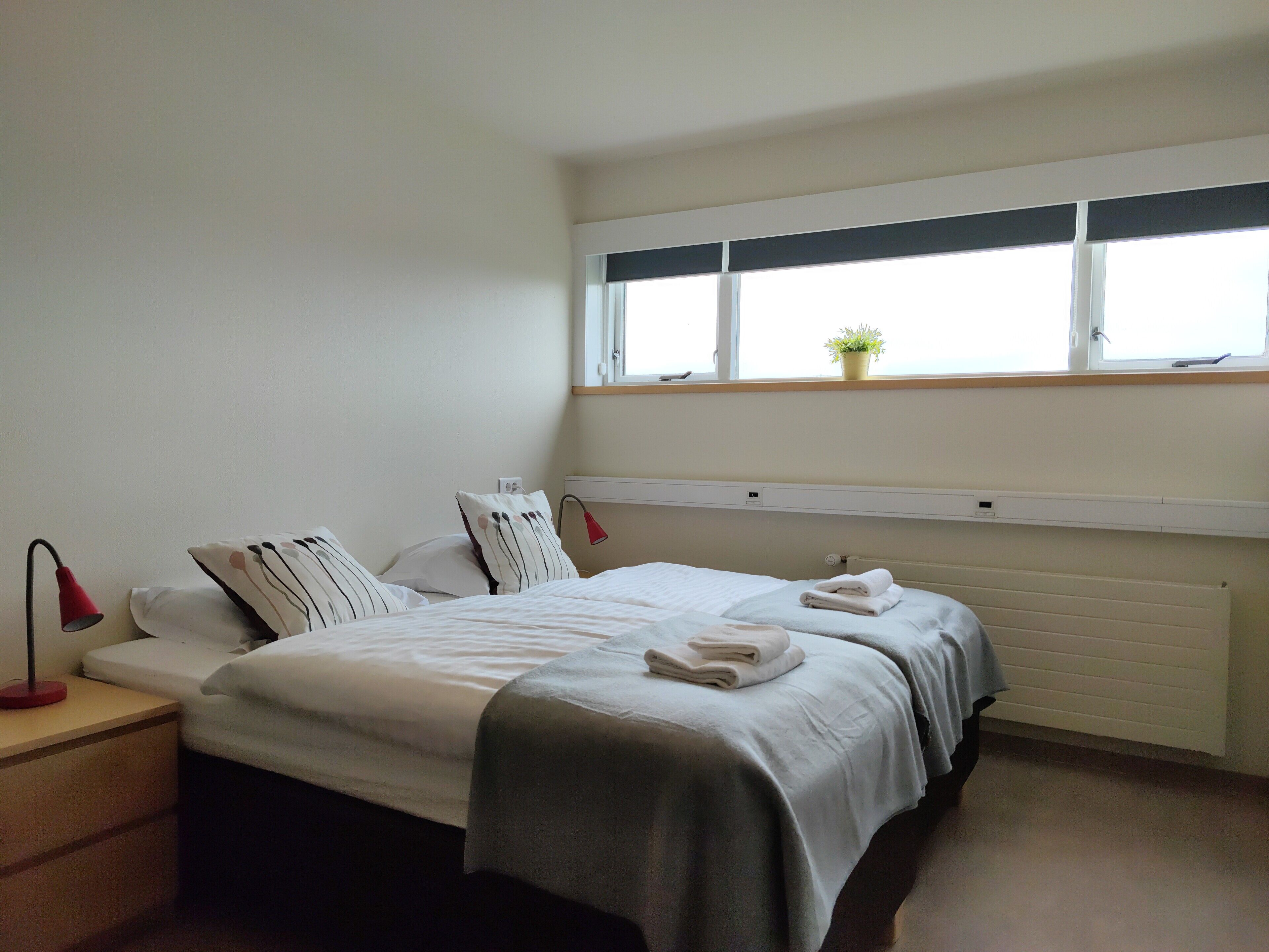 standard double or twin room | desk, blackout curtains, free cots/infant beds, rollaway beds