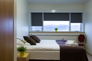 Desk, blackout curtains, free cots/infant beds, rollaway beds