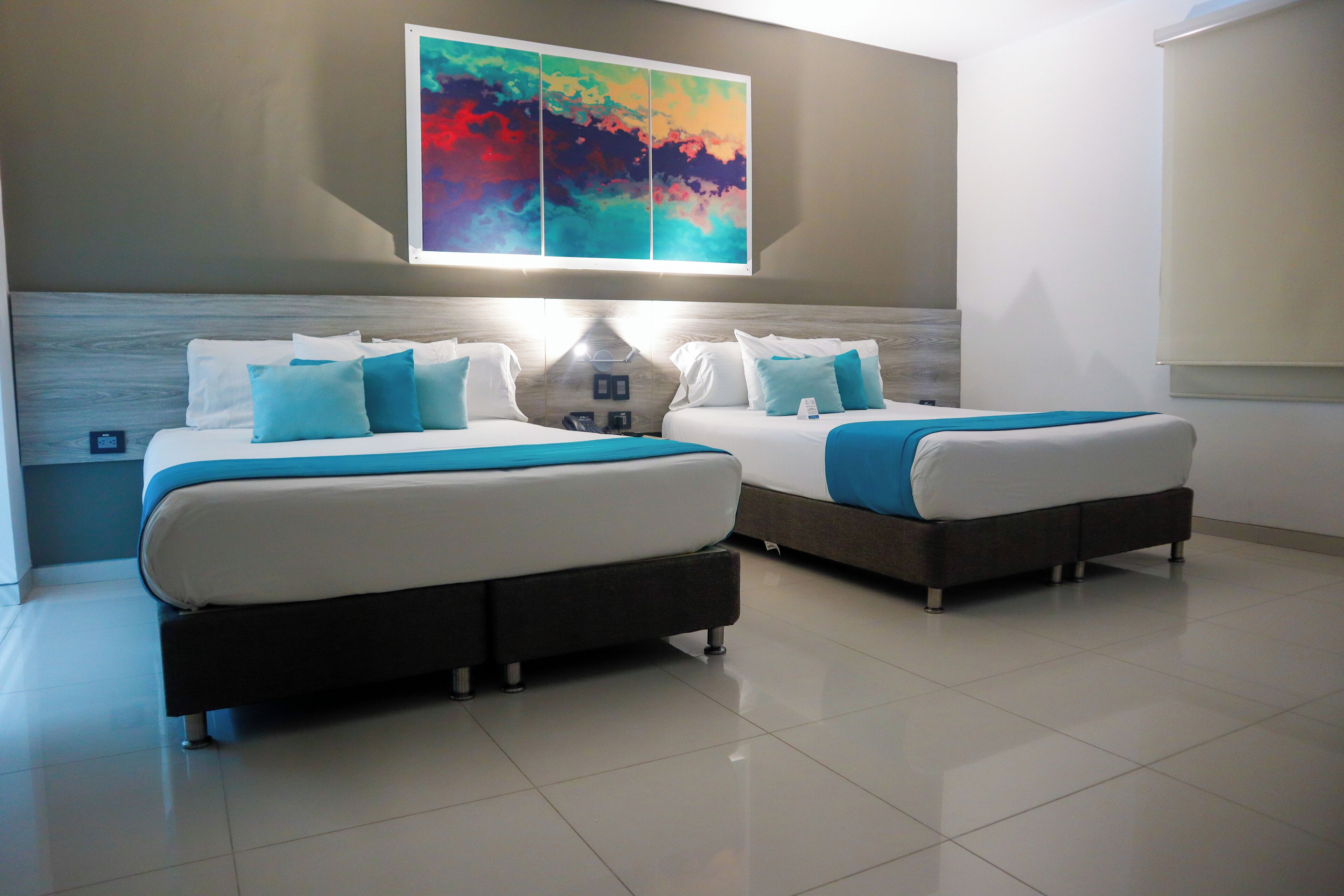 deluxe room | frette italian sheets, premium bedding, down duvets, minibar