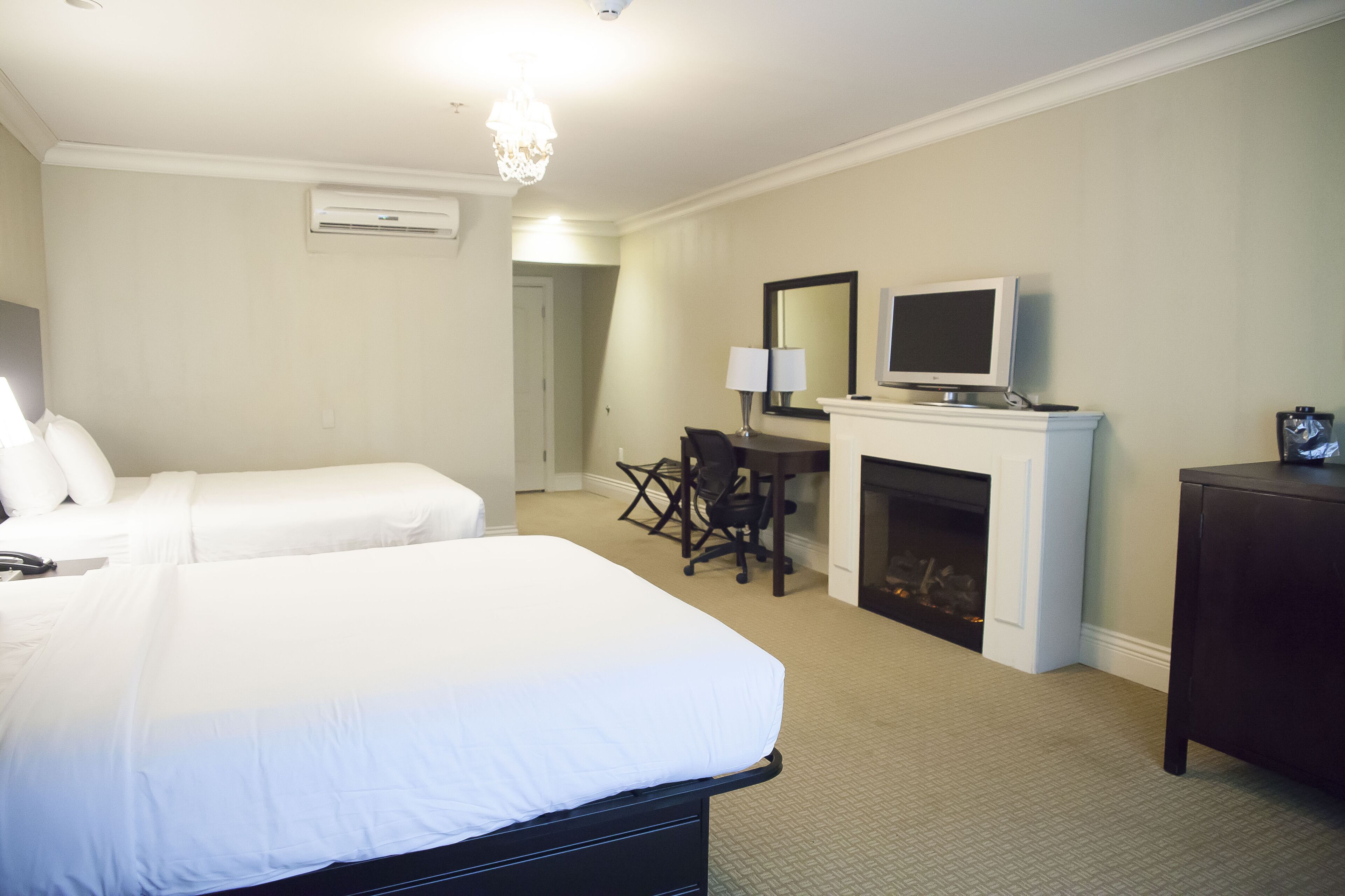 standard room, 2 queen beds | individually decorated, desk, laptop workspace, iron/ironing board