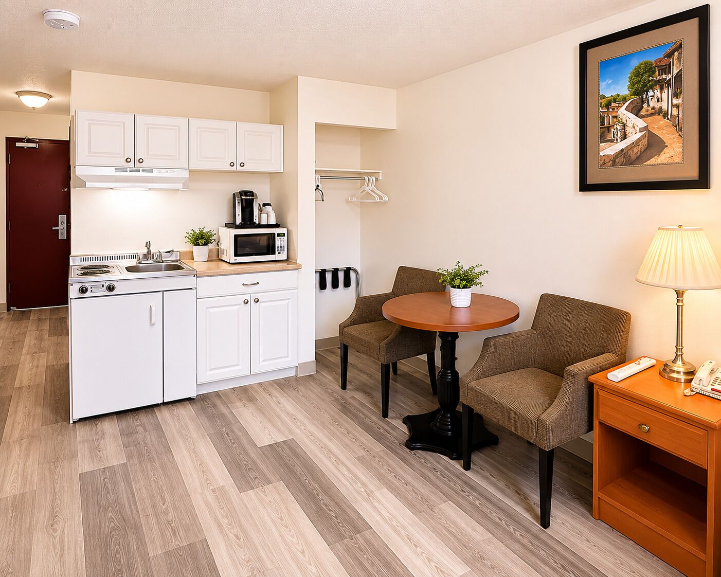 Room, 1 Queen Bed, Kitchenette | Desk, iron/ironing board, free WiFi, bed sheets