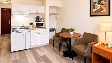 Room, 1 Queen Bed, Kitchenette | Desk, iron/ironing board, free WiFi, bed sheets