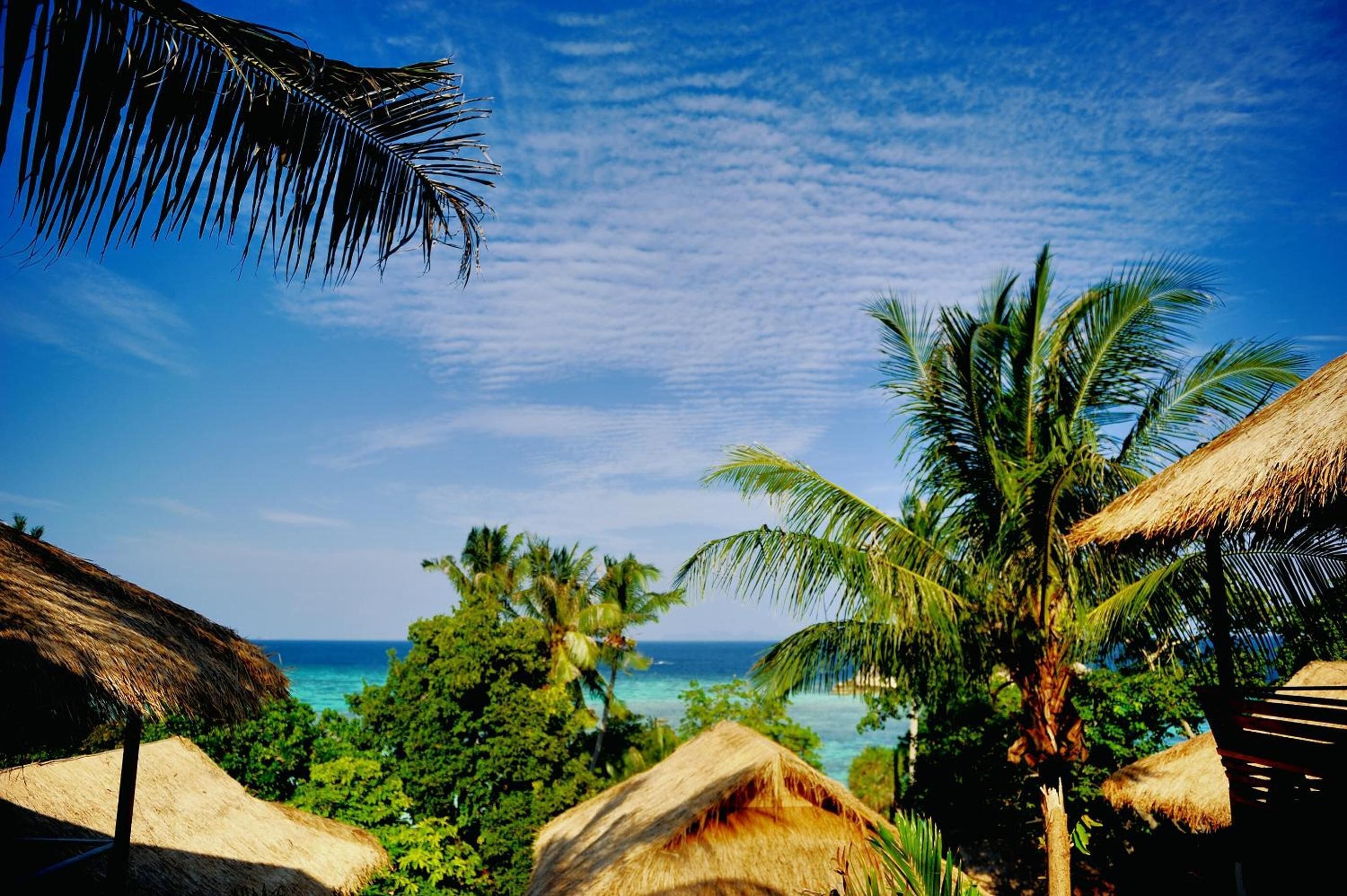 on the beach, white sand, beach towels