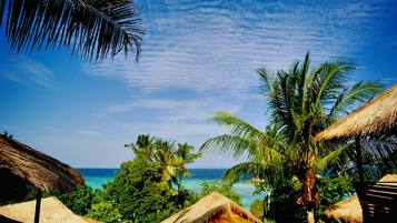 On the beach, white sand, beach towels