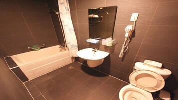 Standard Double Room, 1 Double Bed | Bathroom | Combined shower/tub, free toiletries, hair dryer, slippers
