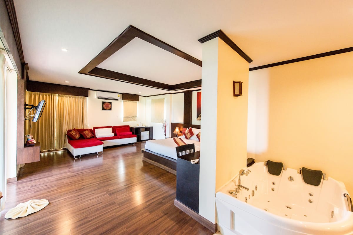 Suite de luna de miel, 1 cama King size, vista parcial al mar | Ropa de cama de alta calidad y minibar