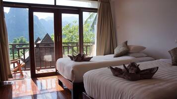 Family Suite, 1 Bedroom, River View | Minibar, in-room safe, desk, laptop workspace