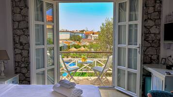 Junior Suite | 1 bedroom, premium bedding, down comforters, minibar