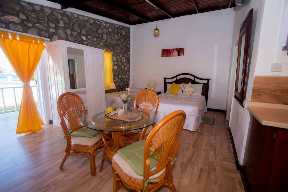 Bungalow, Multiple Beds, Pool View | In-room dining