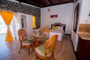 Bungalow, Multiple Beds, Pool View | In-room dining - Kings Landing Hotel (Union Island)
