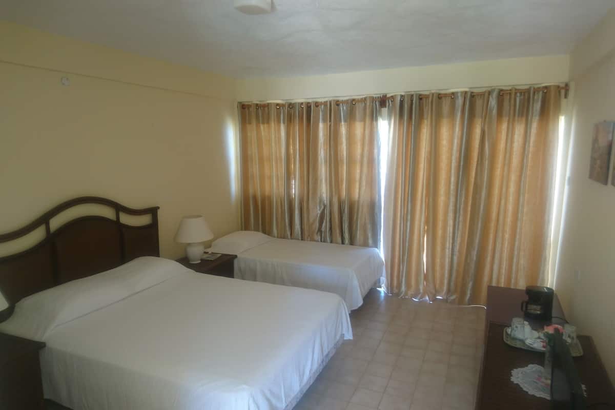 Room, Garden View | Desk, iron/ironing board (on request), WiFi (free), bed sheets