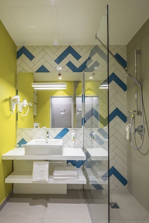 Shower, eco-friendly toiletries, hair dryer, slippers