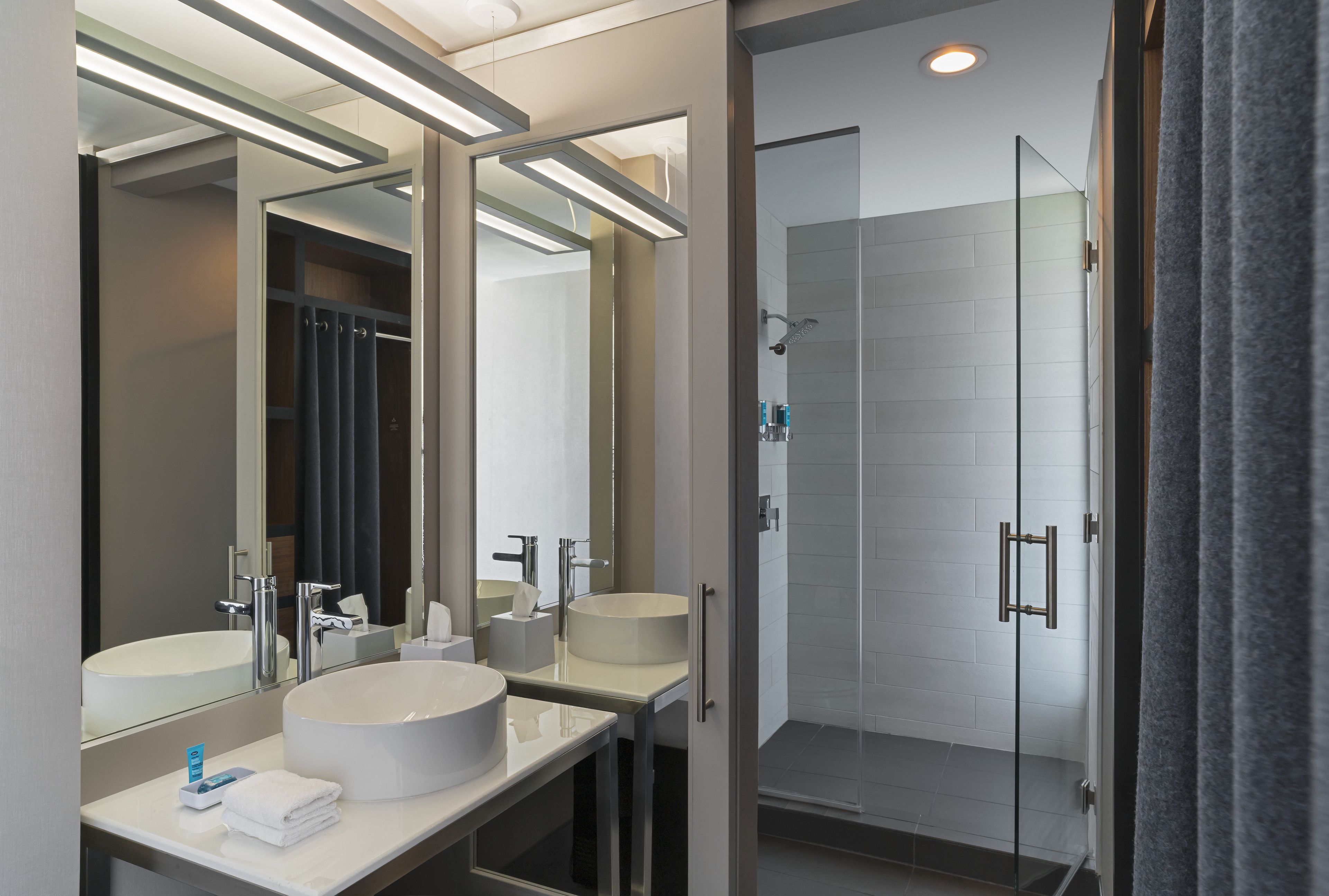 shower, eco-friendly toiletries, hair dryer, towels