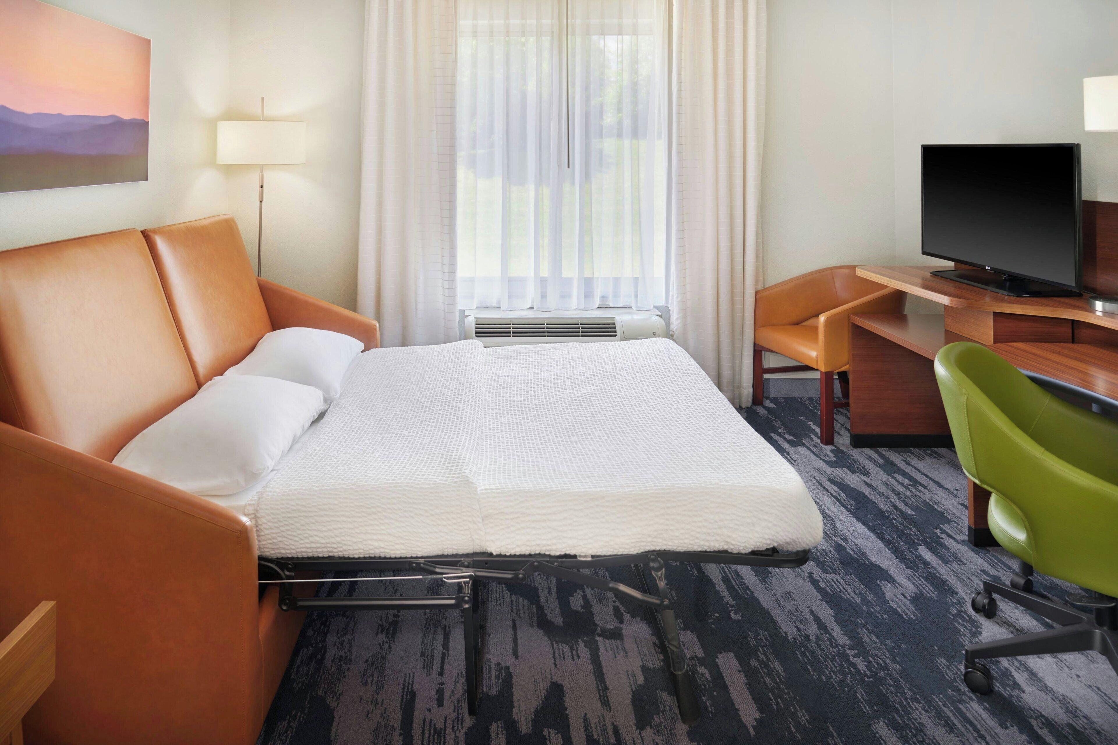 suite, 1 king bed with sofa bed, non smoking | desk, iron/ironing board, free wifi, bed sheets