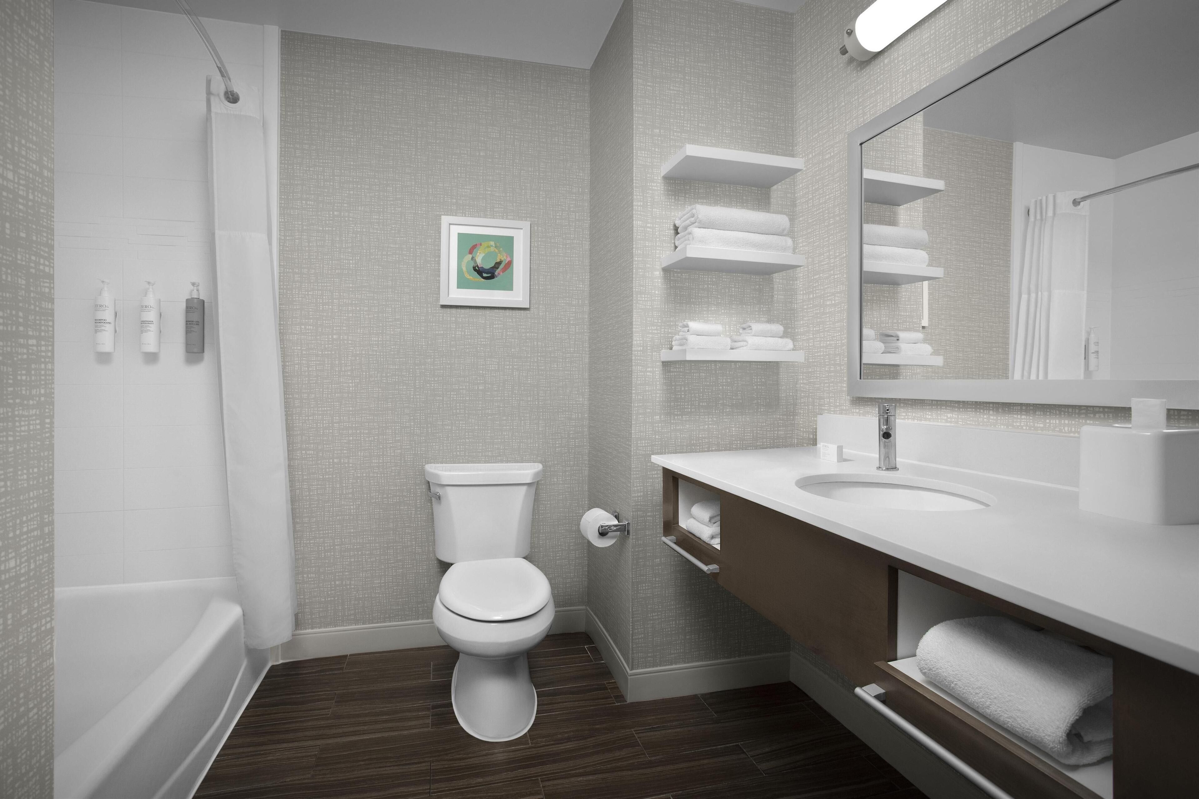 room, 2 queen beds, refrigerator & microwave | bathroom | combined shower/bathtub, towels