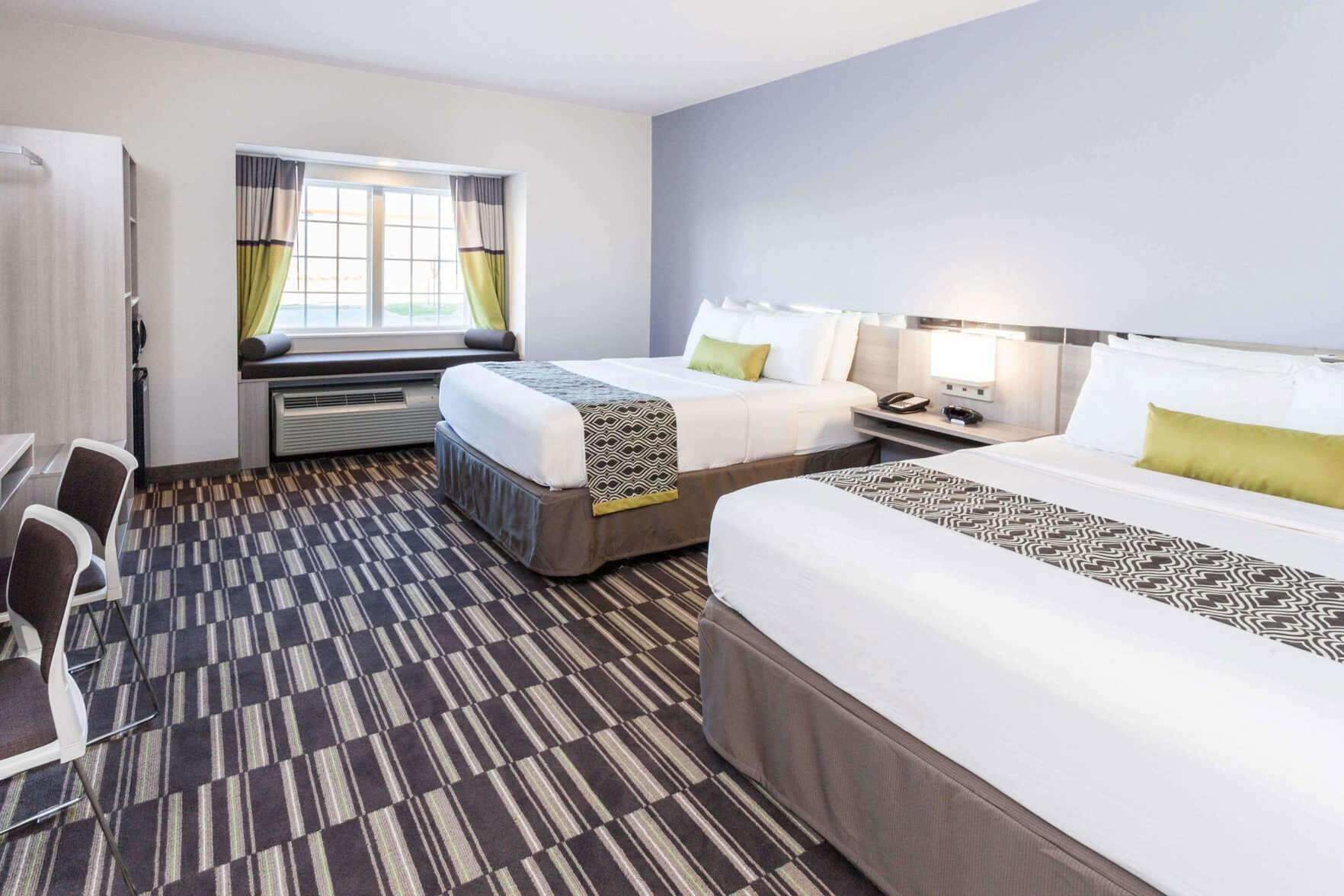 Hypo-allergenic bedding, in-room safe, desk, laptop workspace