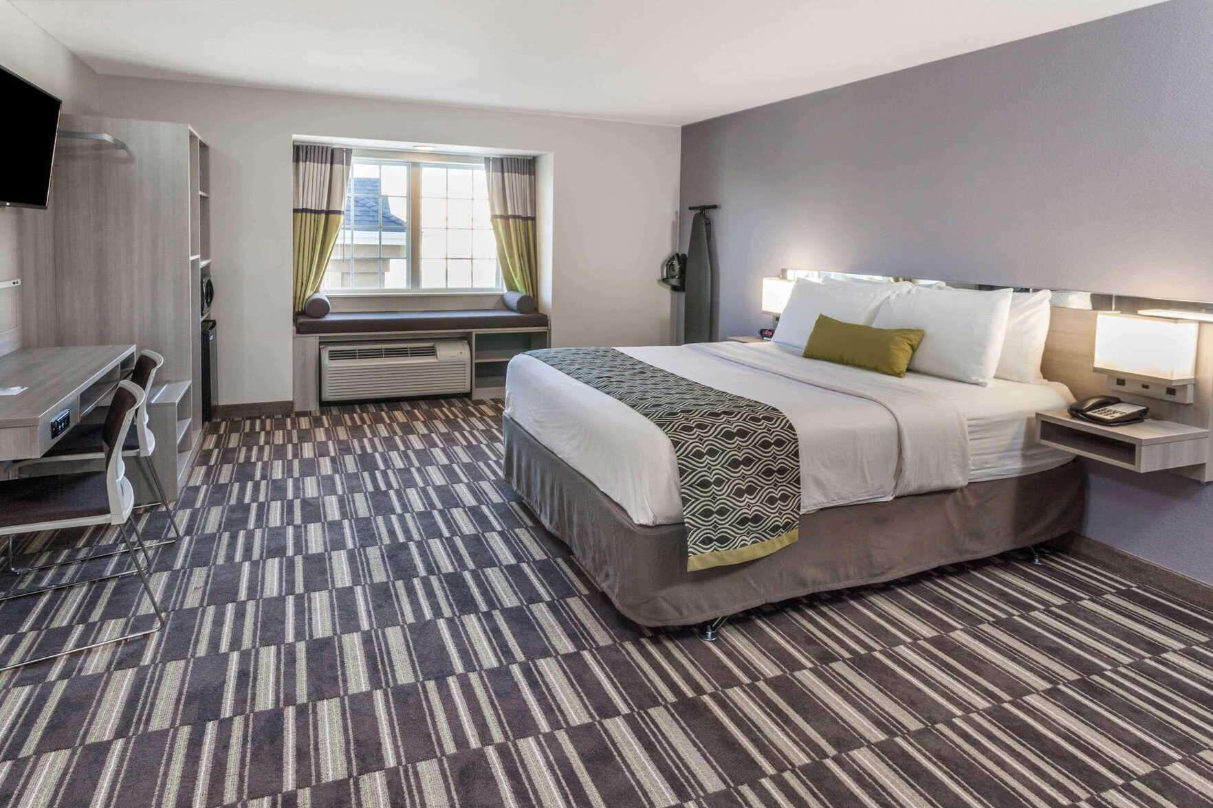 Hypo-allergenic bedding, in-room safe, desk, laptop workspace