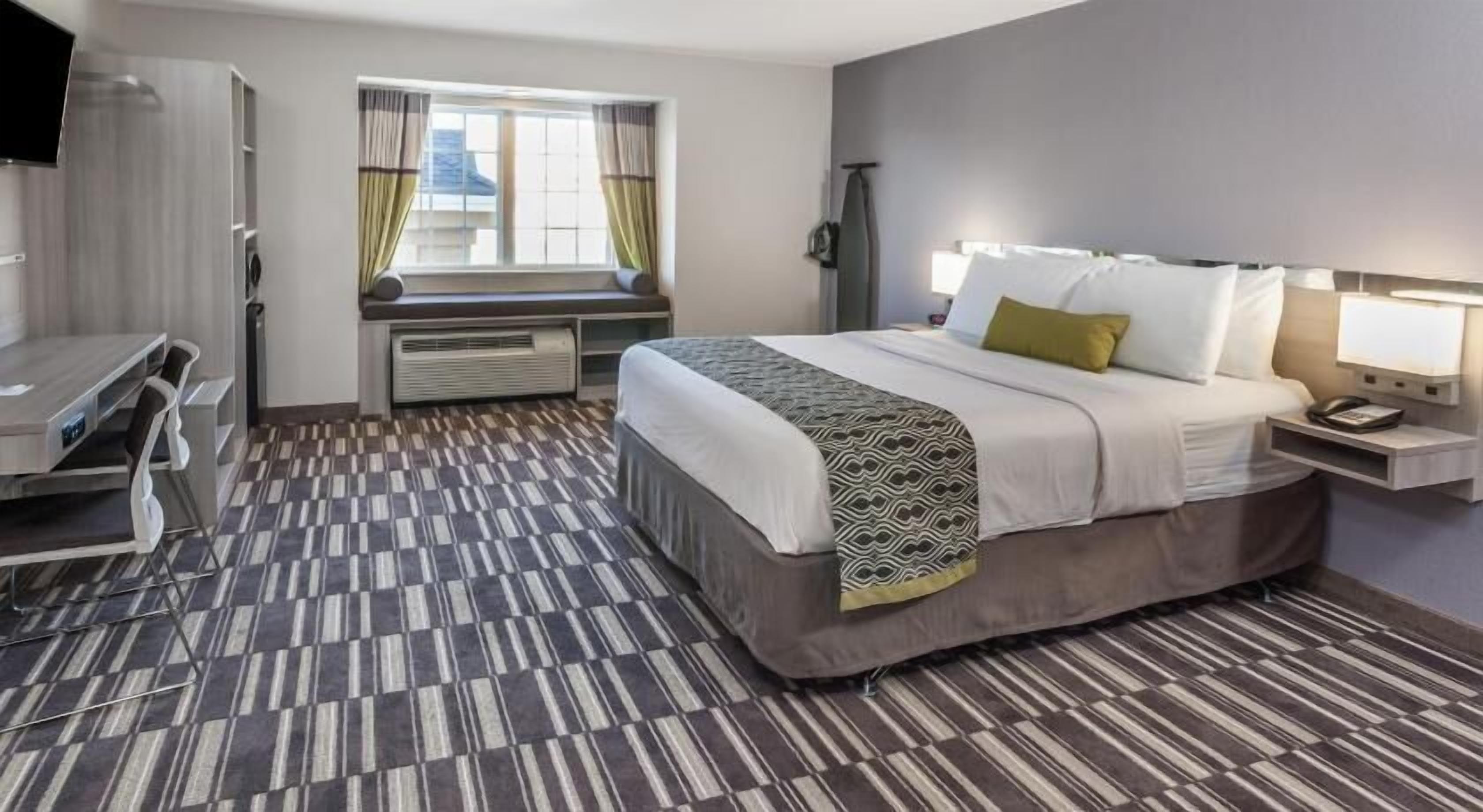 Hypo-allergenic bedding, in-room safe, desk, laptop workspace