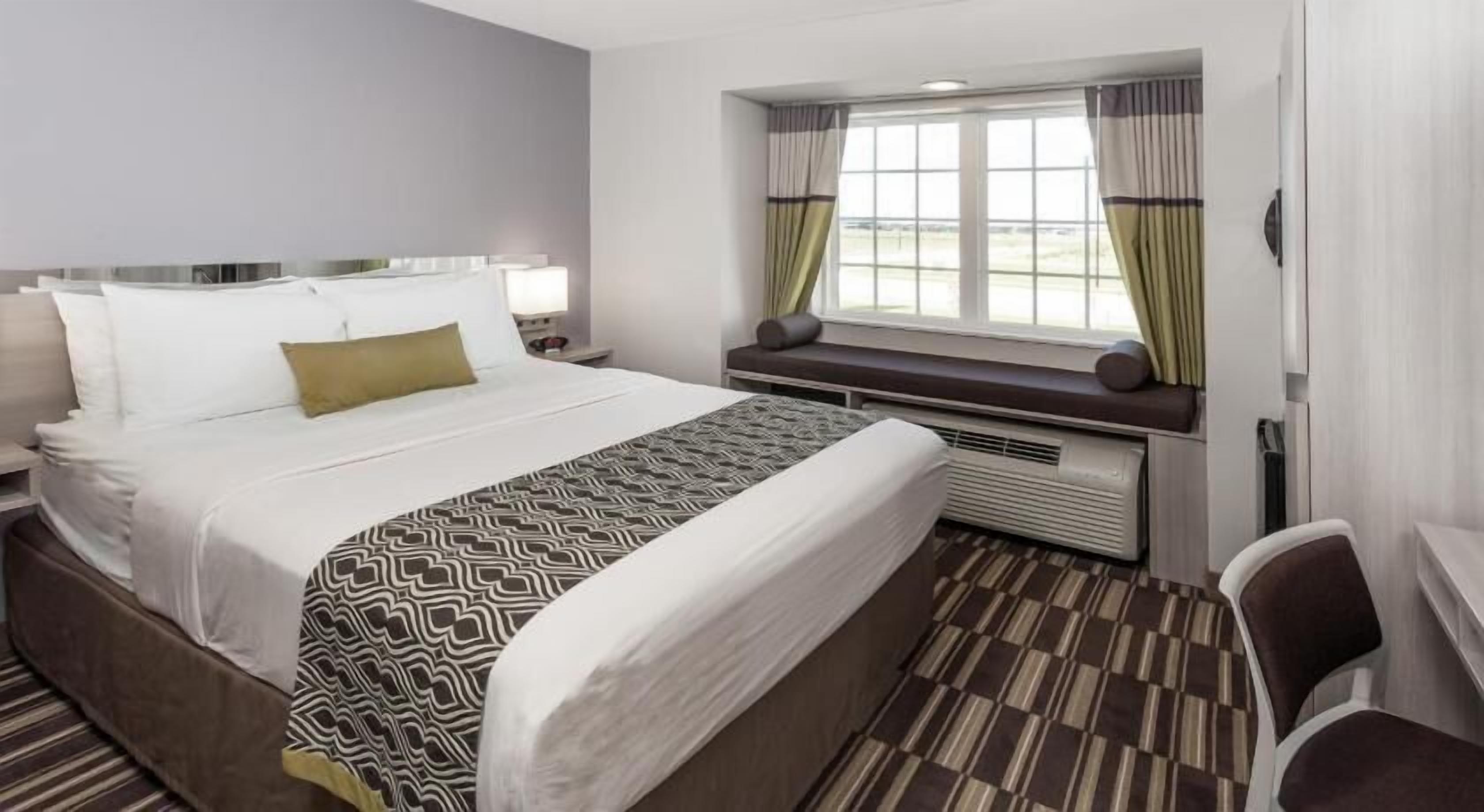 Hypo-allergenic bedding, in-room safe, desk, laptop workspace