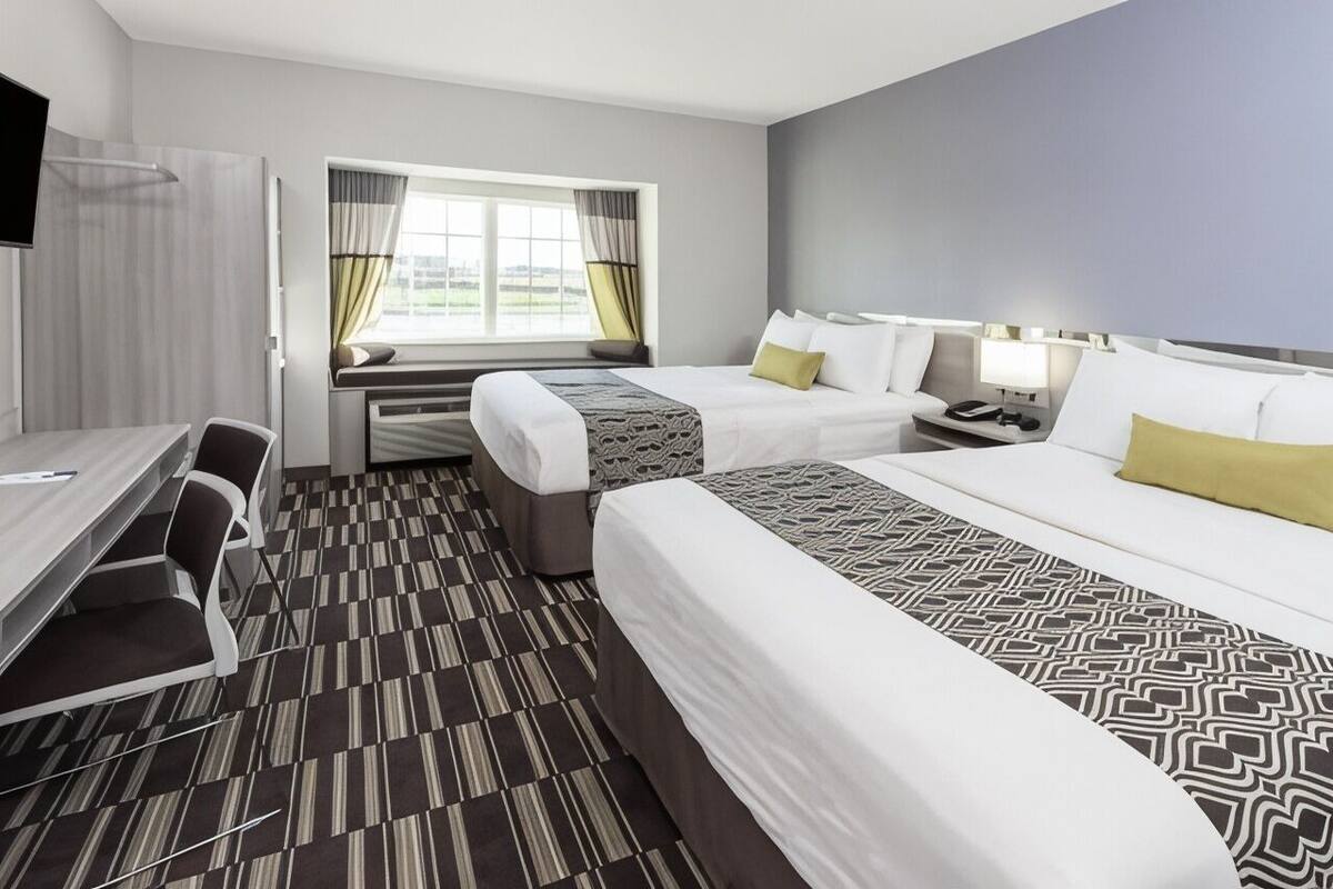 Hypo-allergenic bedding available, in-room safe, desk, laptop workspace