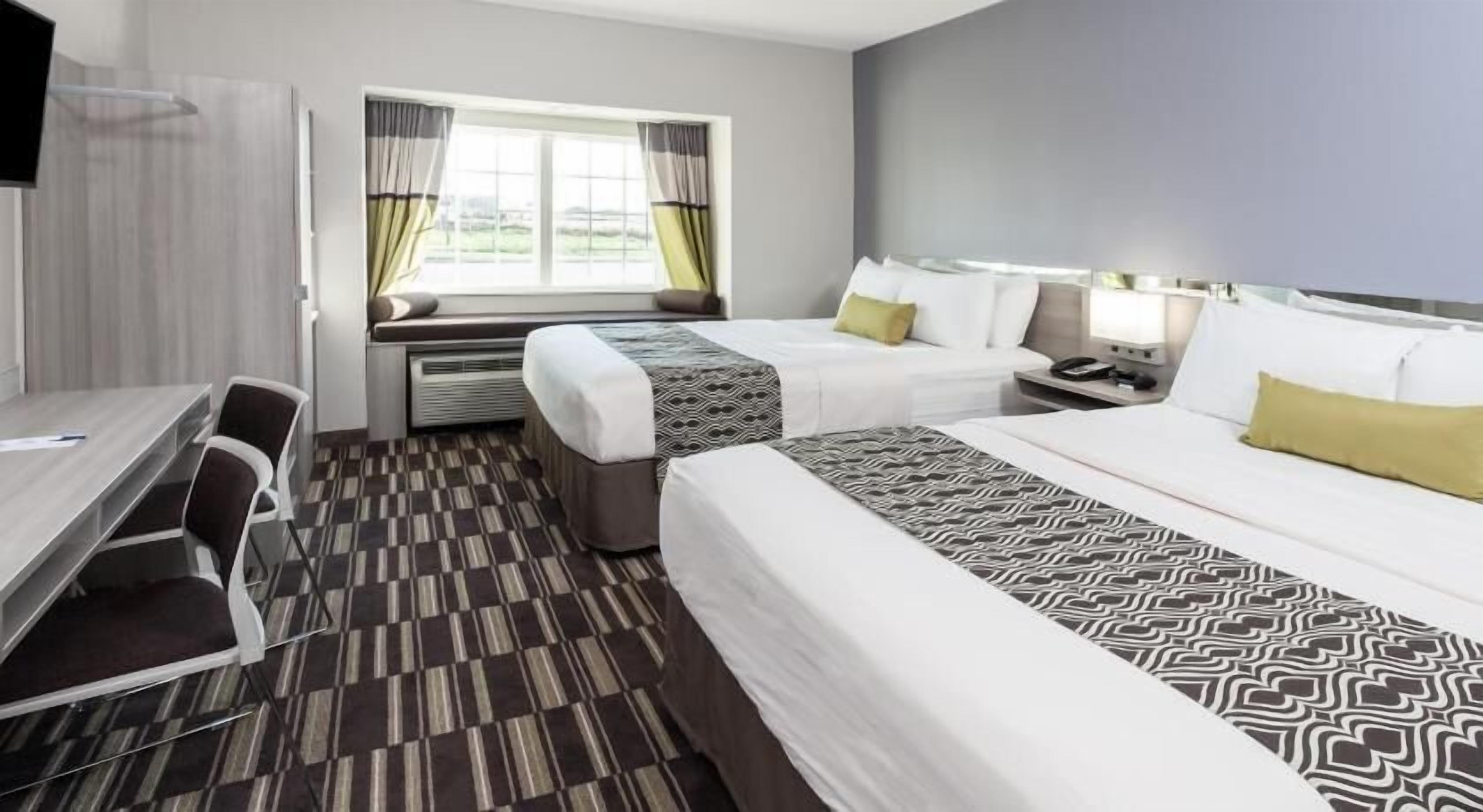 Hypo-allergenic bedding, in-room safe, desk, laptop workspace