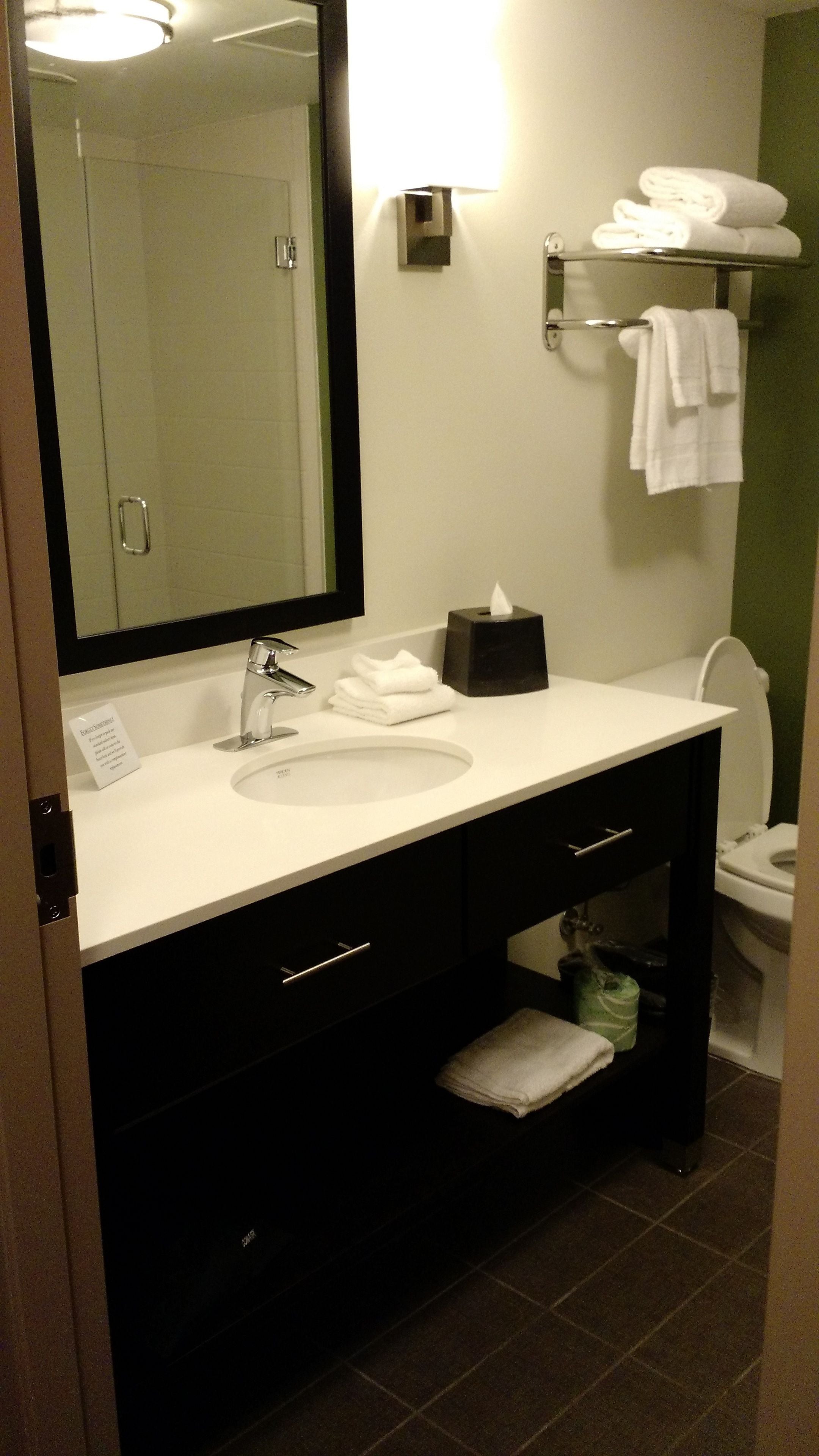 suite, 1 king bed with sofa bed, non smoking | bathroom | free toiletries, hair dryer, towels, soap