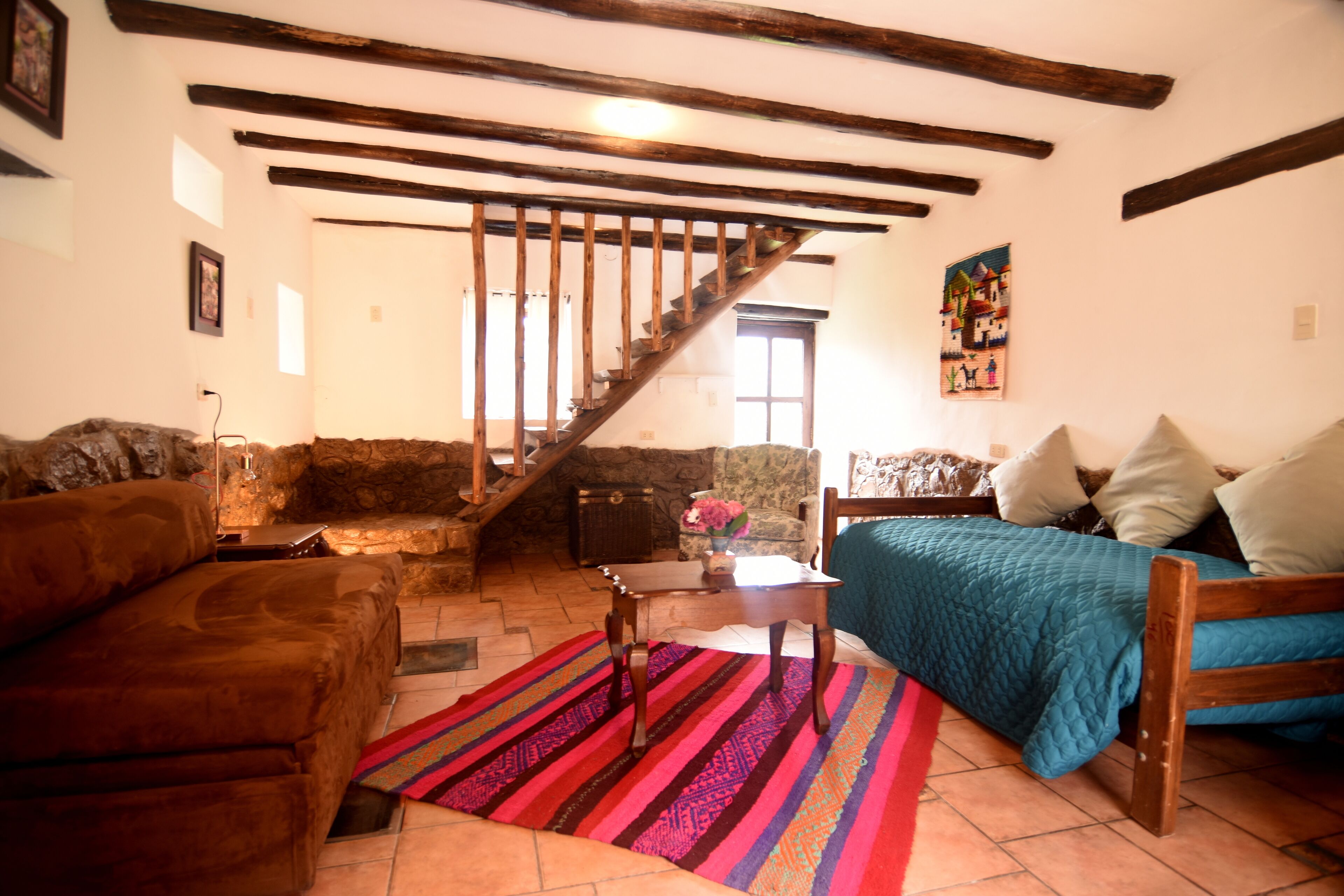 deluxe suite | living area | 32-inch tv with cable channels