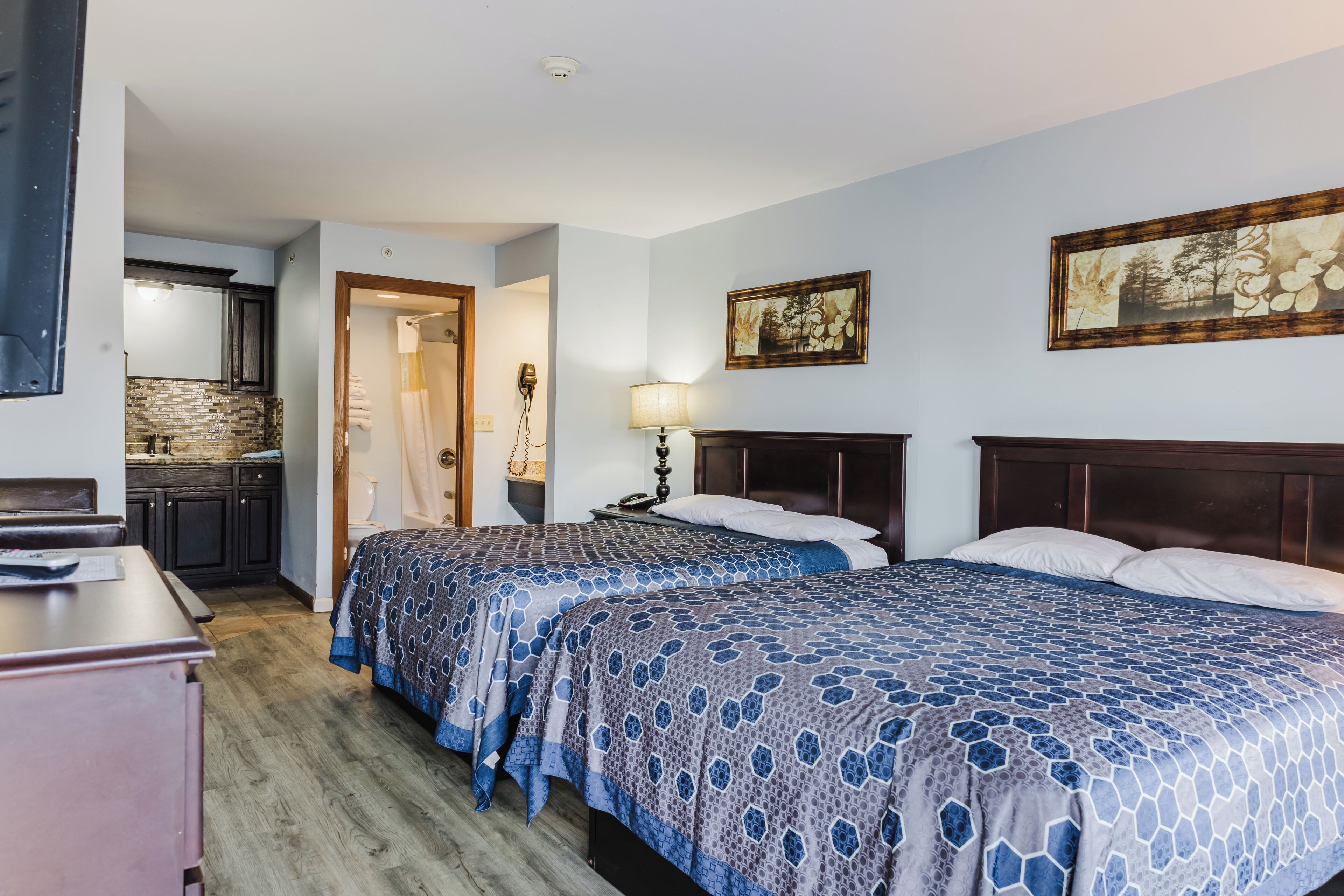 Economy Room, 2 Queen Beds, Kitchenette | Free WiFi, bed sheets