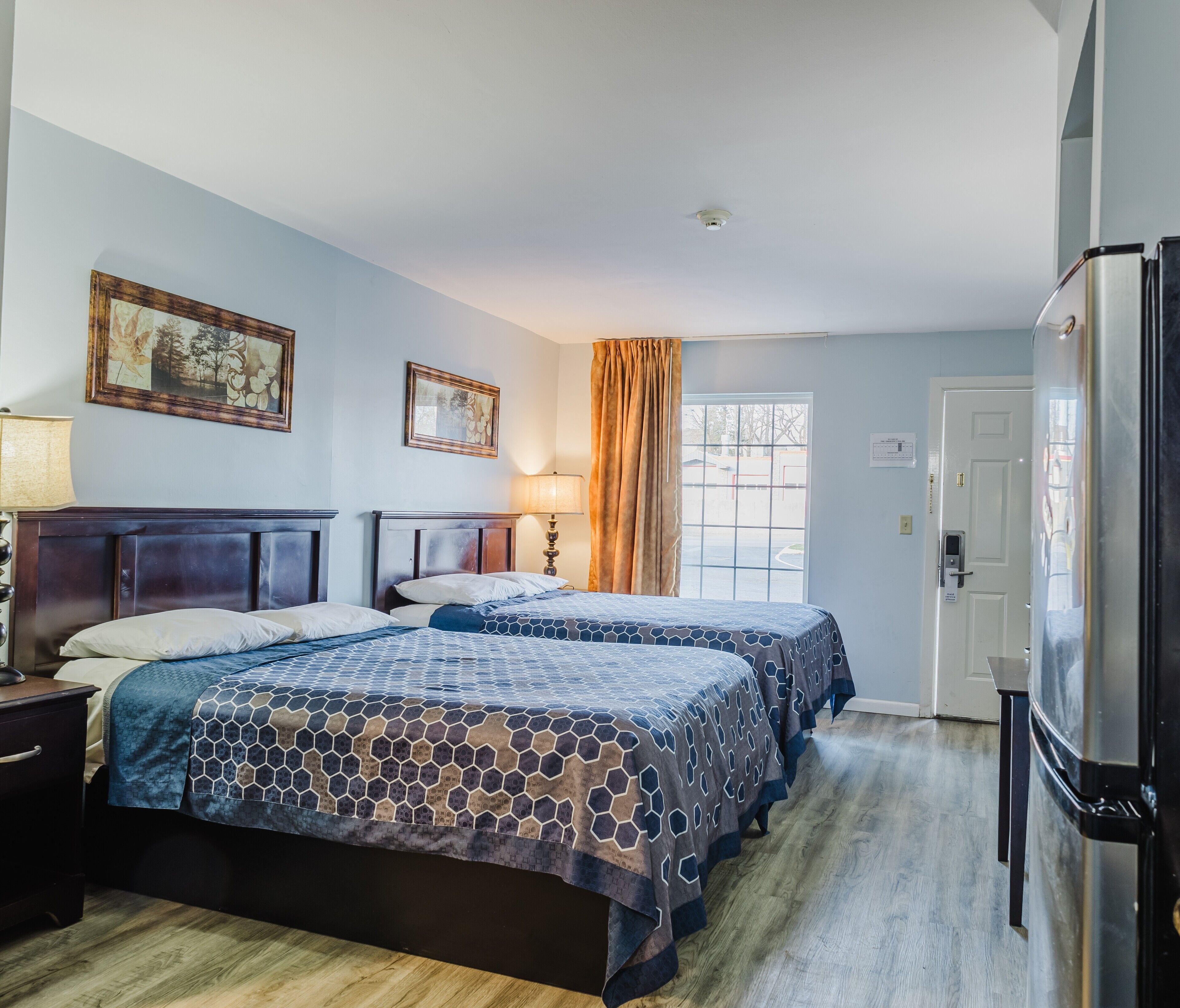 Economy Room, 2 Queen Beds, Kitchenette | Free WiFi, bed sheets