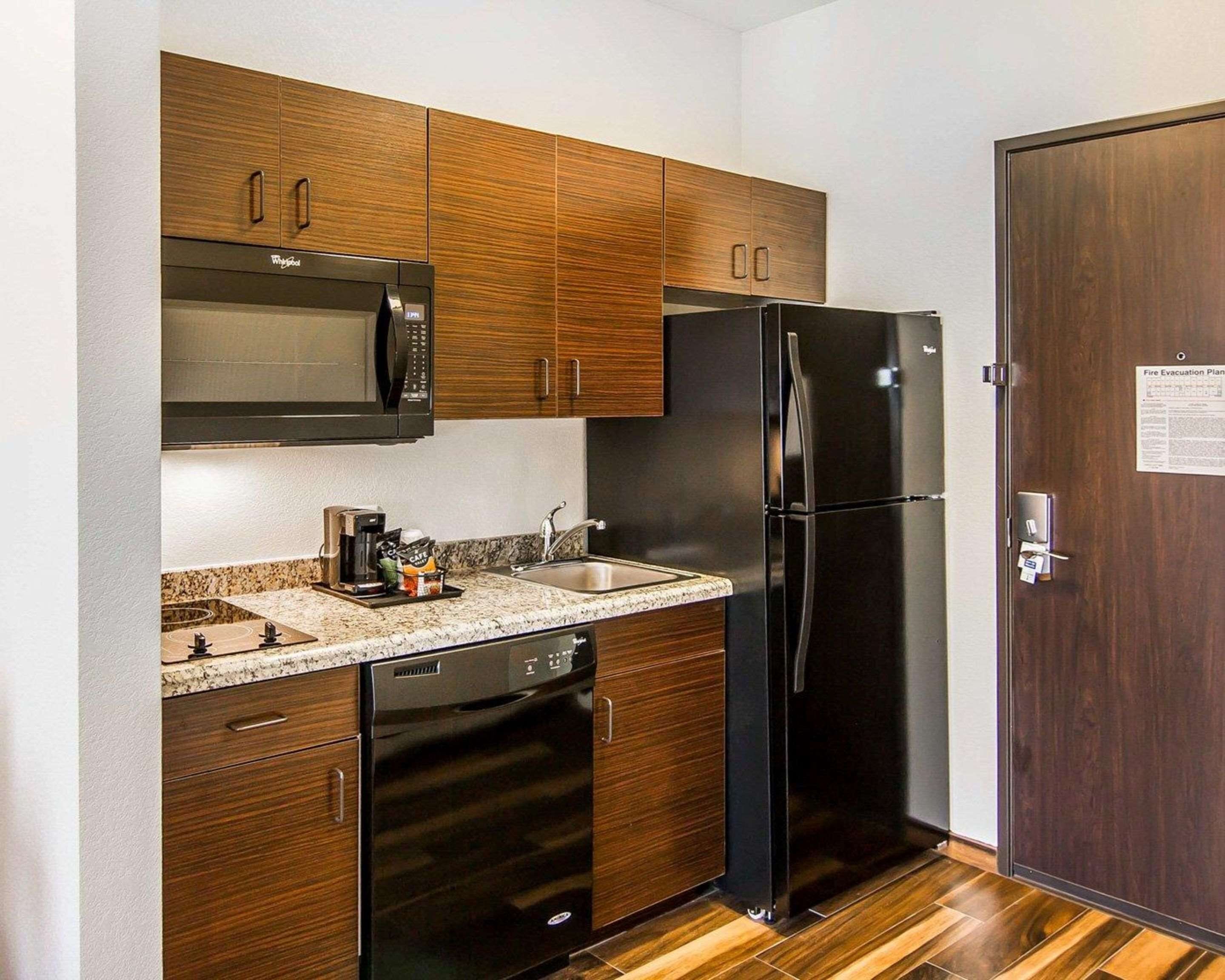 suite, 2 queen beds | pillow-top beds, desk, iron/ironing board, free wifi