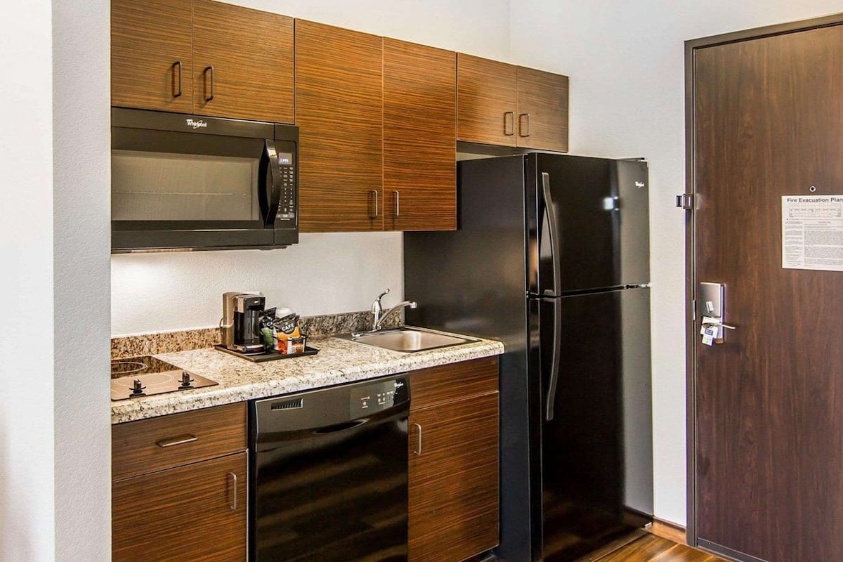 suite, 2 queen beds | pillow-top beds, desk, iron/ironing board, free wifi