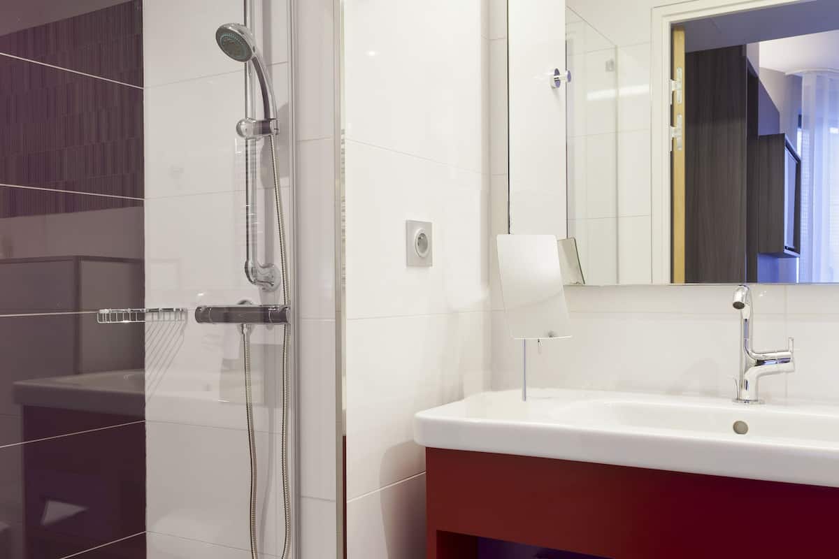 shower, eco-friendly toiletries, hair dryer, towels