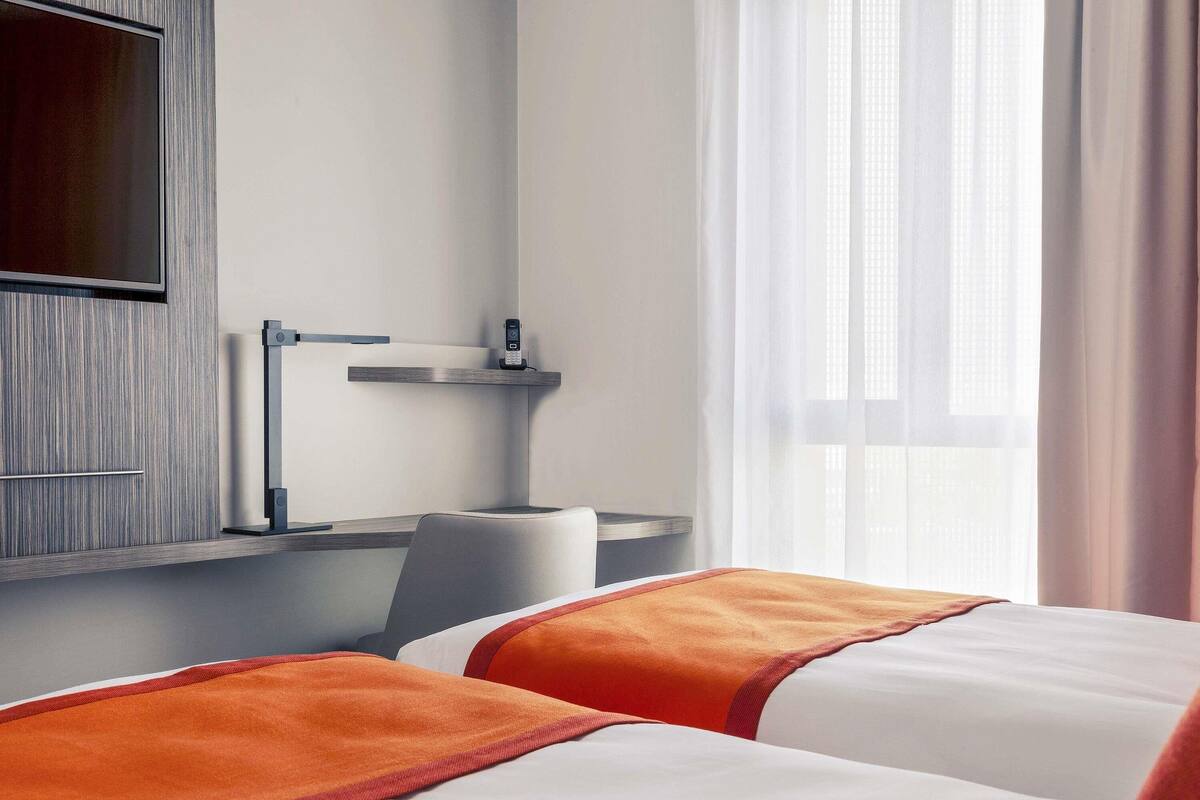 Ropa de cama de alta calidad y minibar