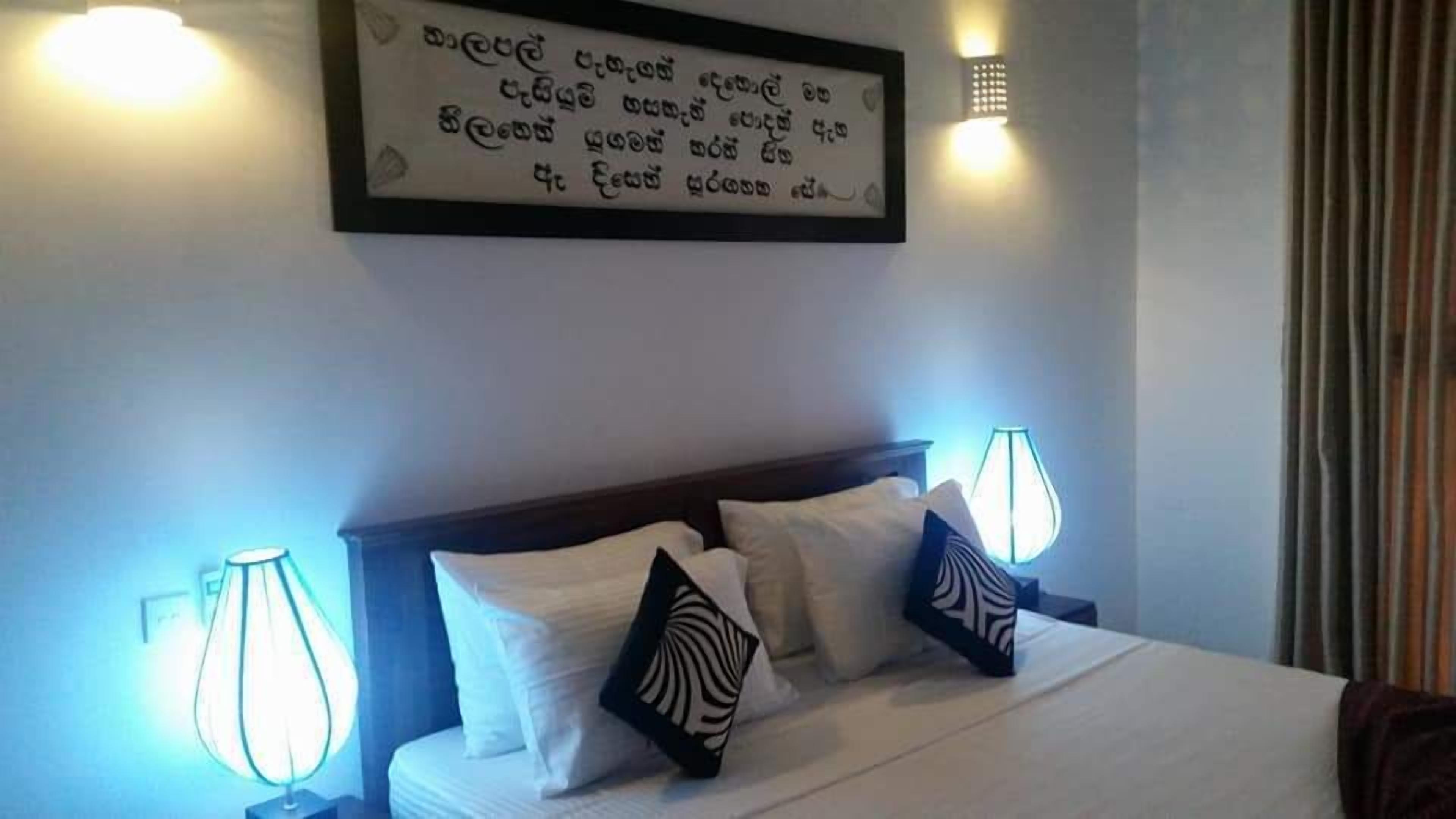 deluxe double room, 1 king bed, lake view, lakeside | 1 bedroom, premium bedding, minibar, individually decorated