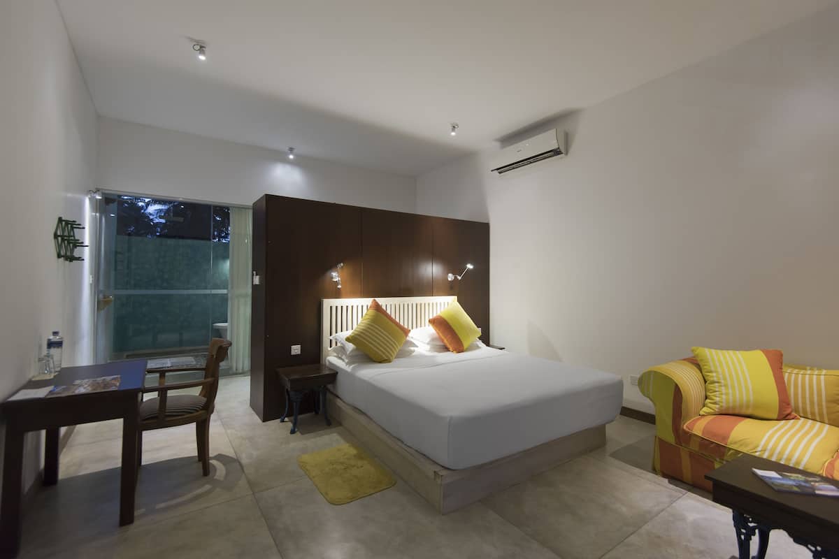 Camera Deluxe, 1 letto queen | Minibar, una cassaforte in camera, con stile personalizzato