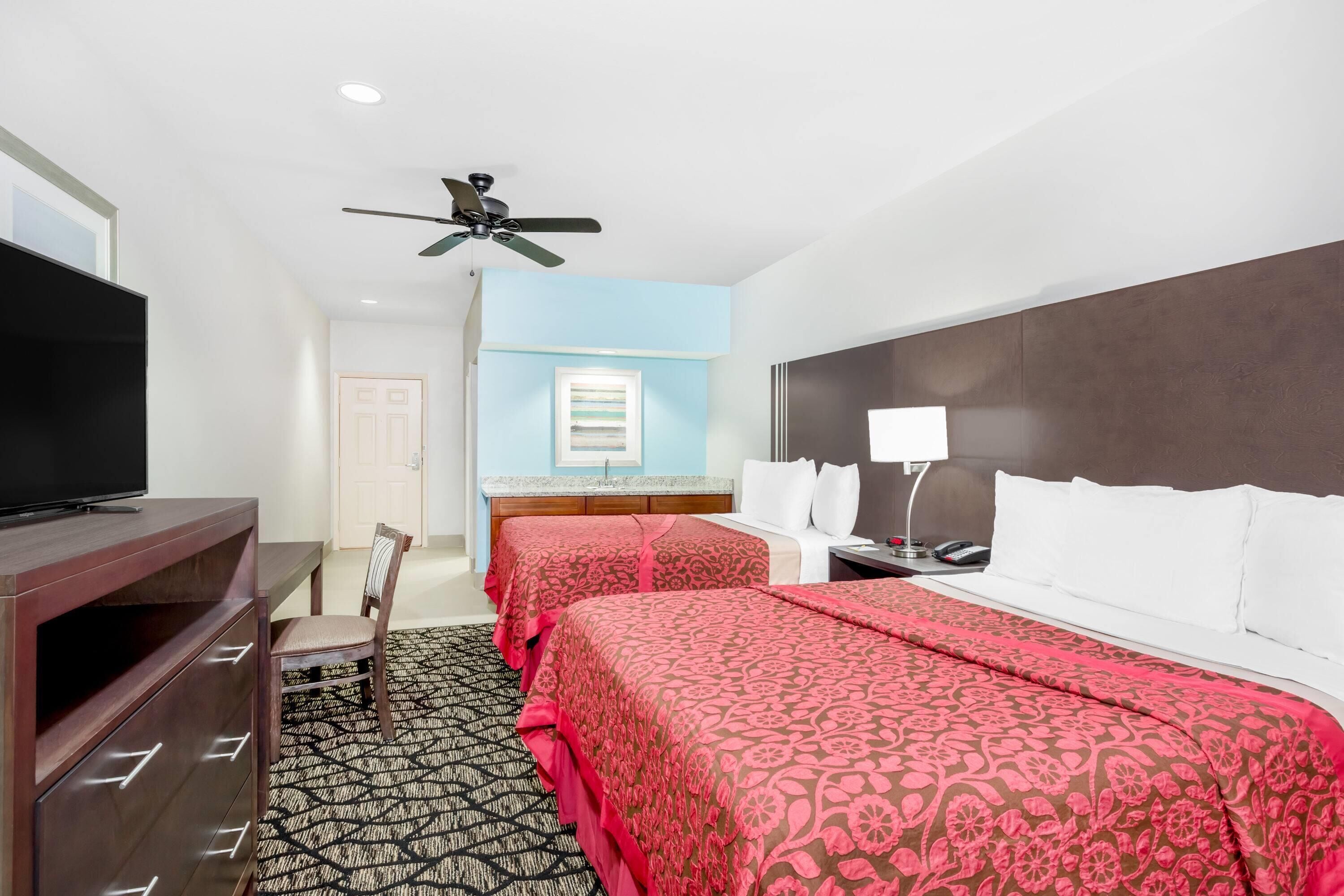 Pillow-top beds, desk, blackout curtains, iron/ironing board