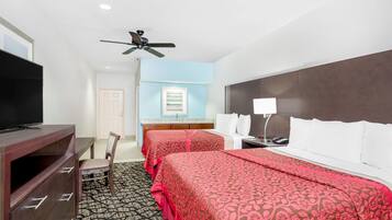 Pillowtop beds, desk, blackout drapes, iron/ironing board