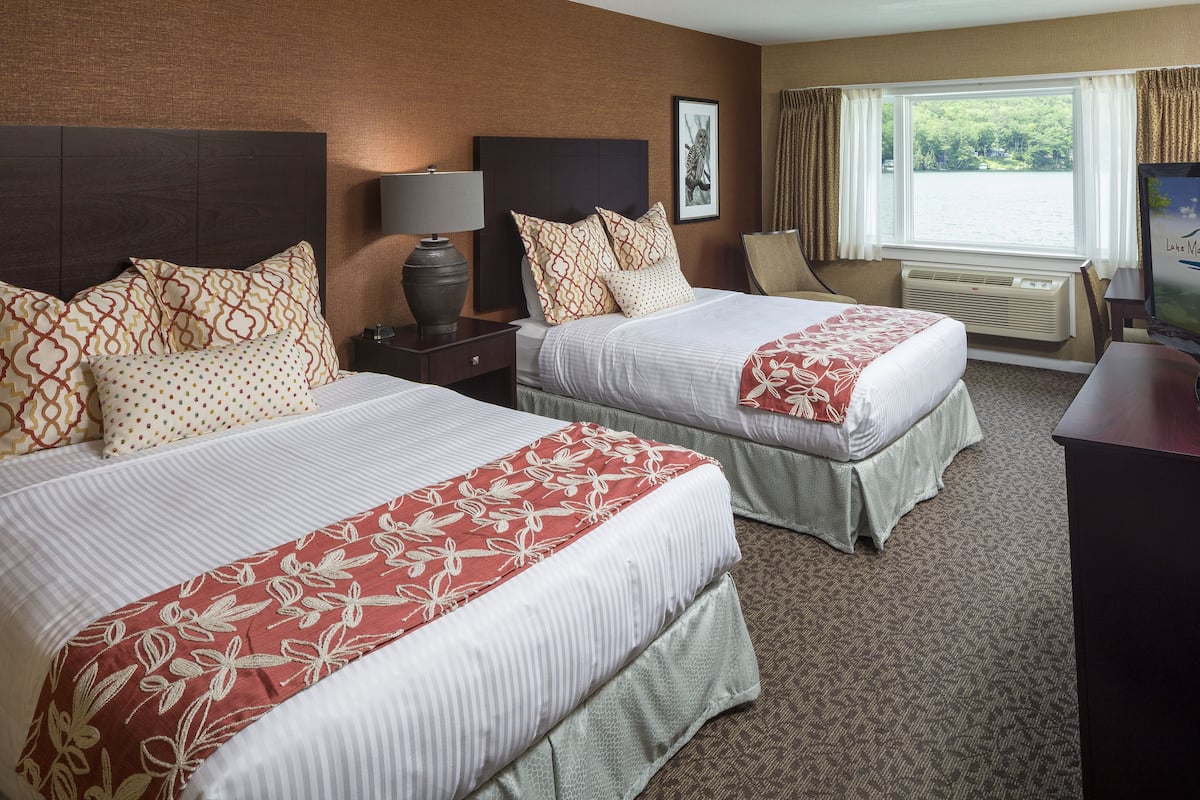 premium bedding, laptop workspace, blackout curtains, iron/ironing board