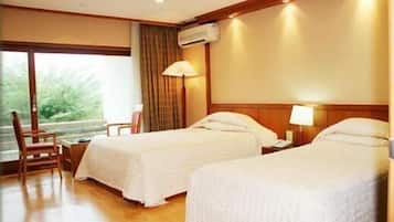 Twin Room, Mountain View | Minibar, desk, laptop workspace, blackout drapes