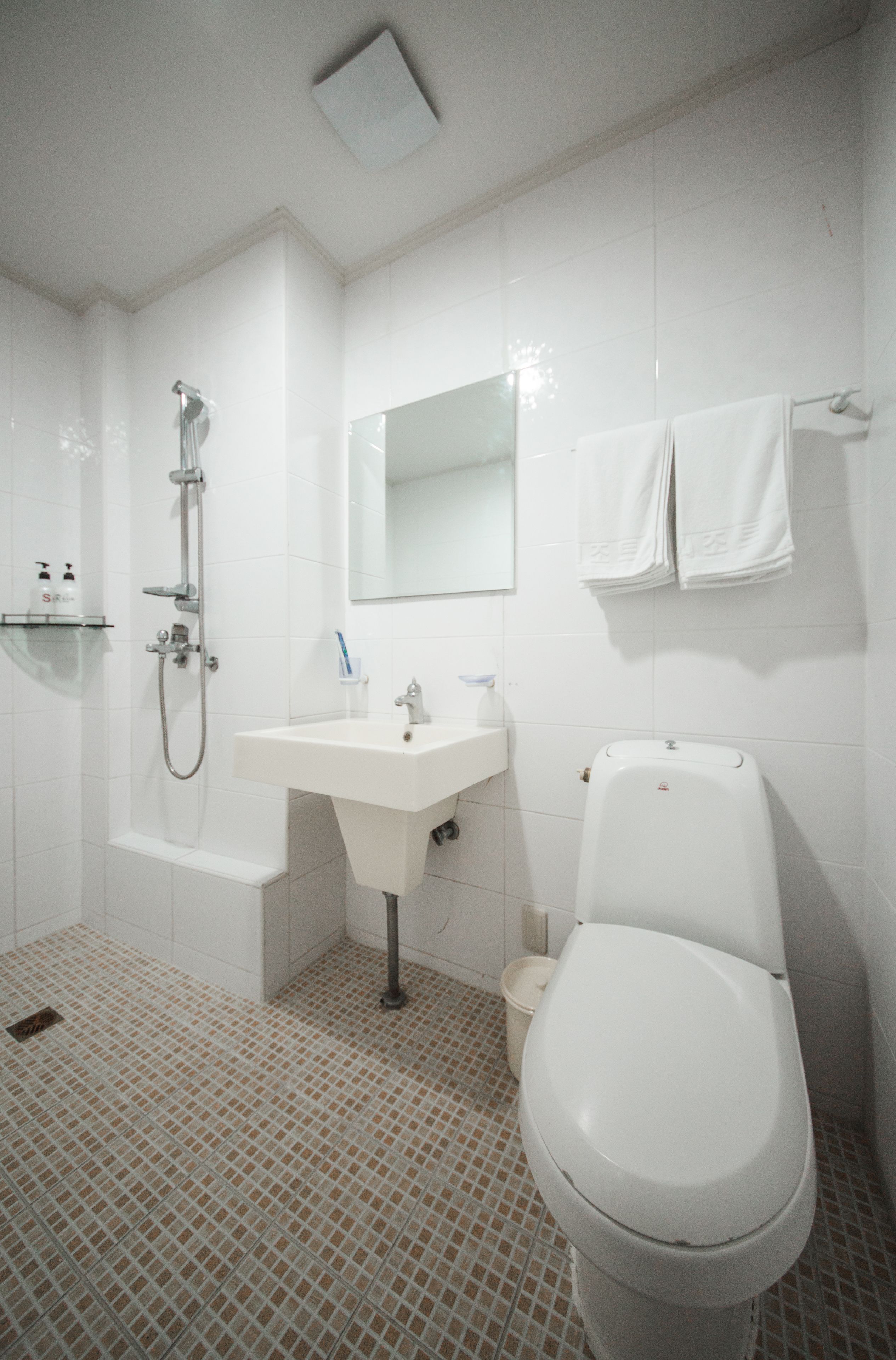 family room | bathroom | shower, free toiletries, hair dryer, slippers