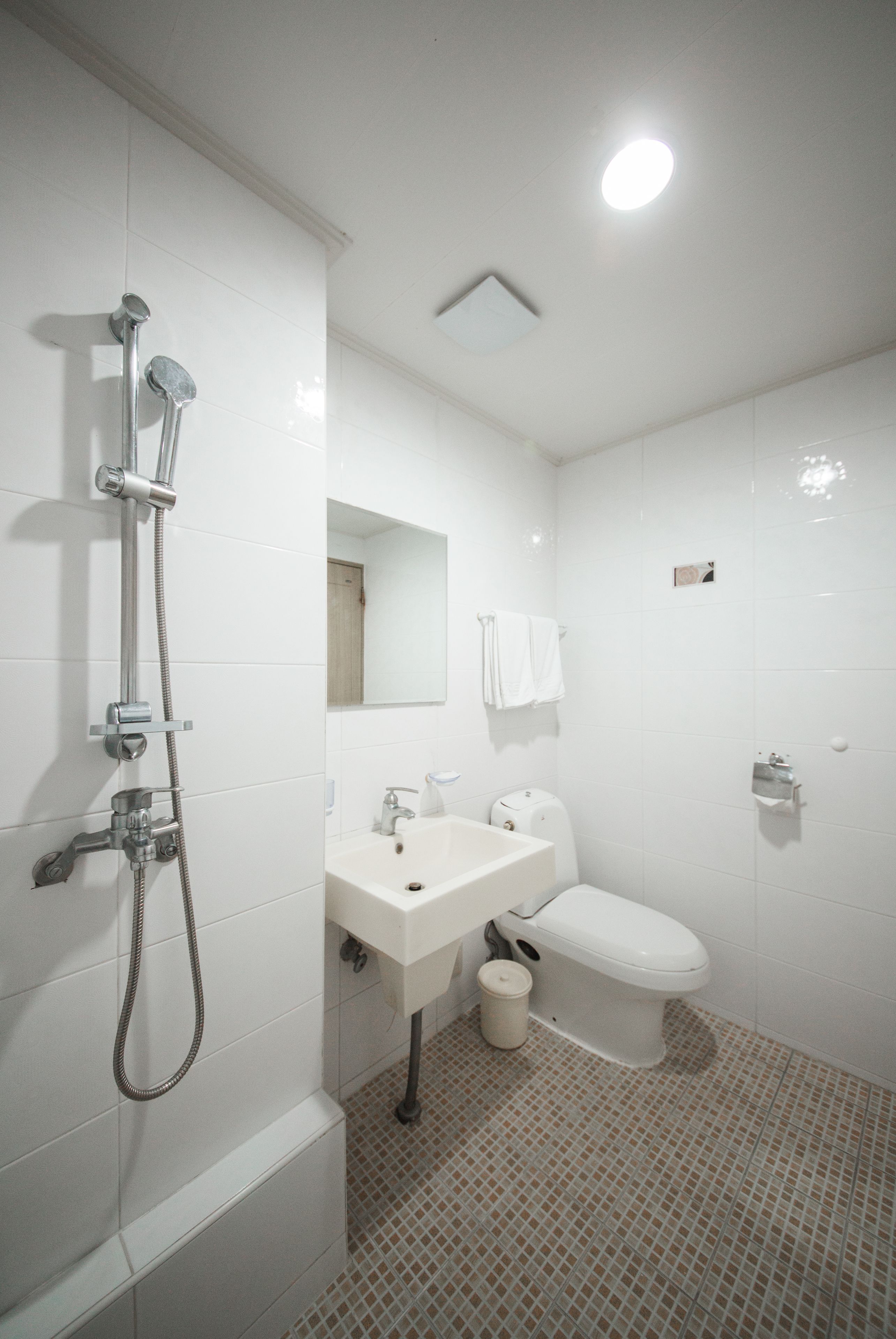 family room | bathroom | shower, free toiletries, hair dryer, slippers