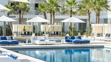 Indoor pool, outdoor pool, pool umbrellas, sun loungers