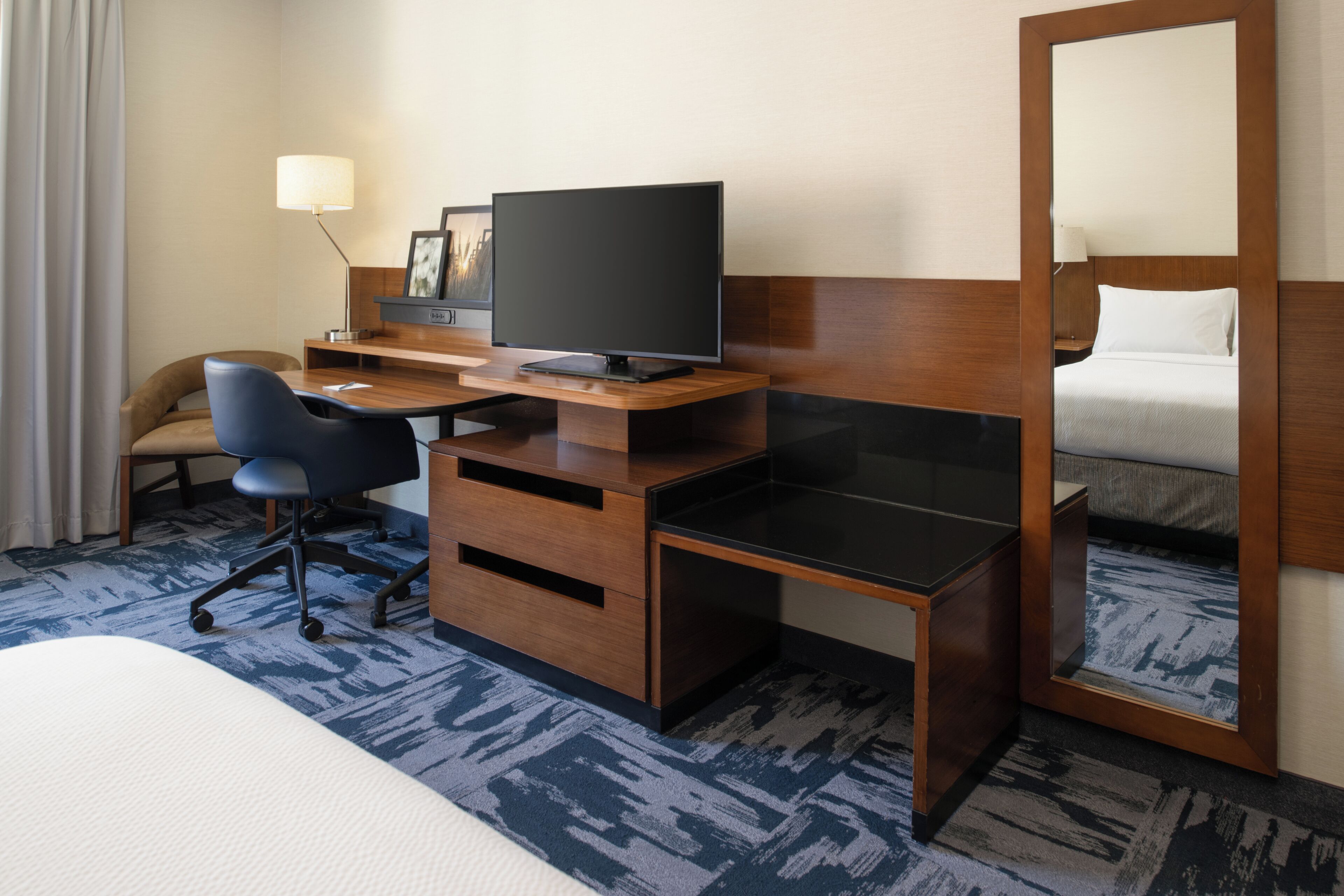 hypo-allergenic bedding, in-room safe, desk, blackout curtains