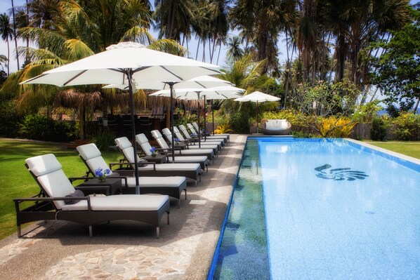 Outdoor pool, pool umbrellas, pool loungers