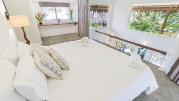 Premium bedding, down comforters, minibar, in-room safe