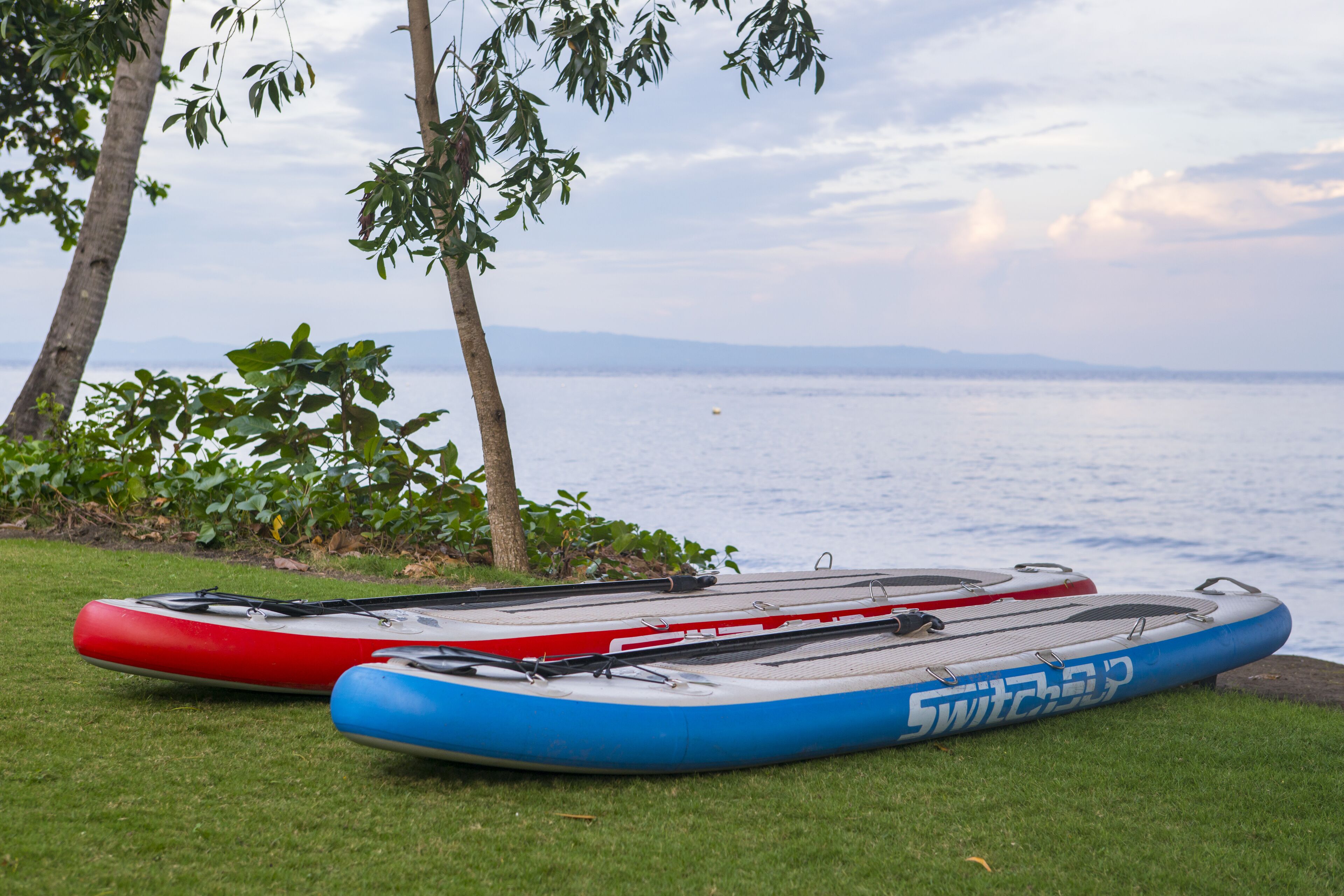 on the beach, sun-loungers, beach umbrellas, beach towels