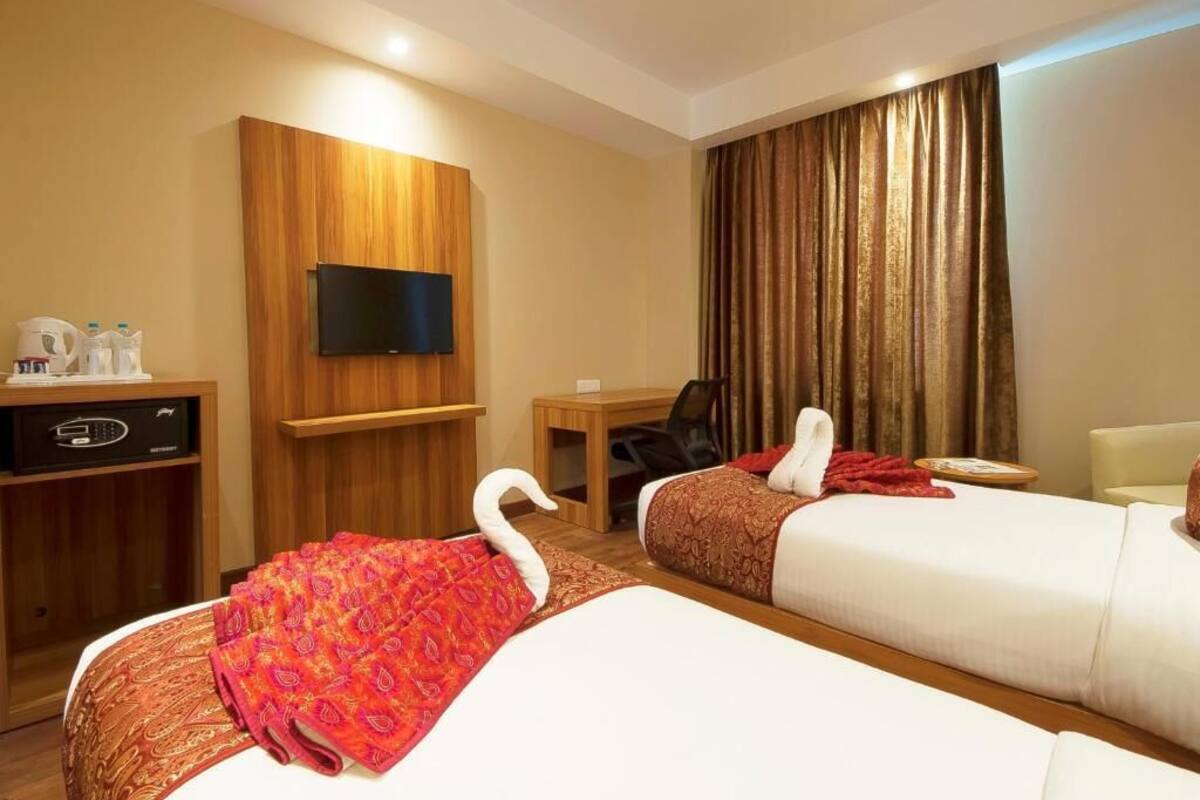 Egyptian cotton sheets, premium bedding, down duvets, in-room safe