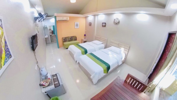 Ropa de cama de alta calidad, minibar, escritorio y camas extra 