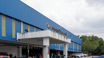 A large blue building with a sign that reads "JASA".